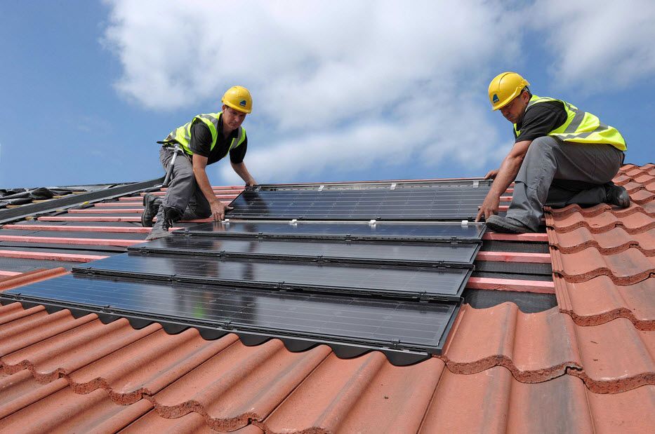 roofers working on roof