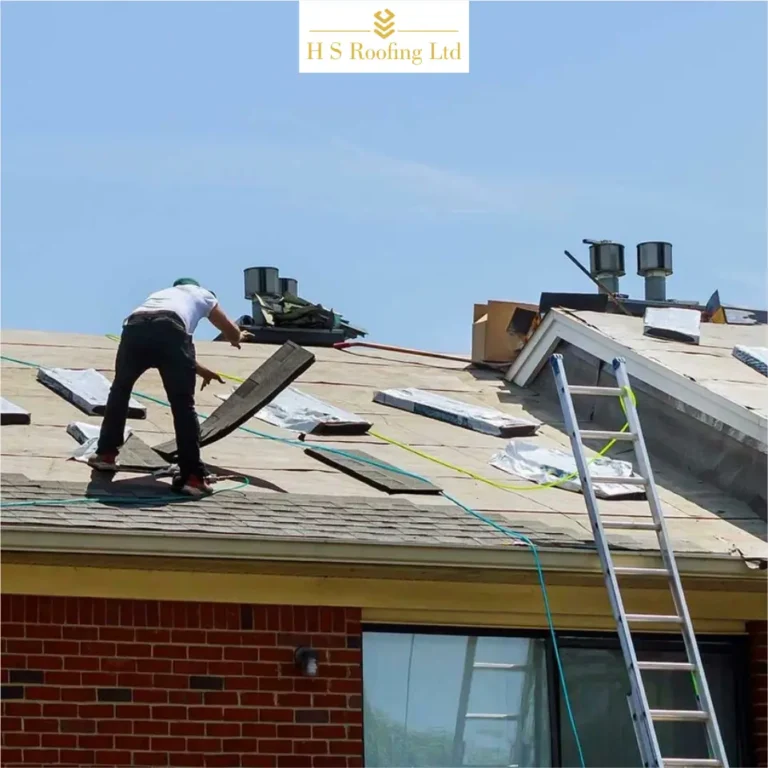 Roofers in Hammersmith repairing residential roof