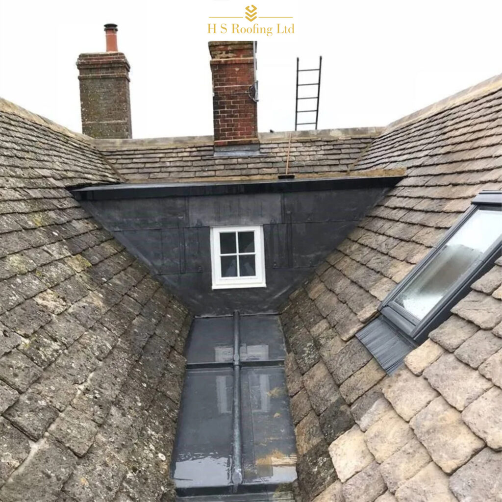 Roofers repairing a roof in Kingston upon Thames